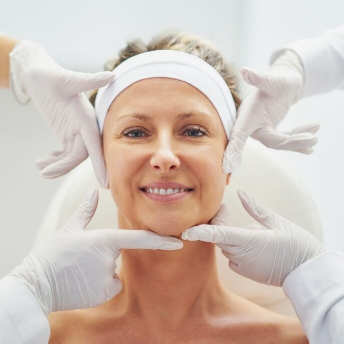 Aesthetic practitioner attending to a client